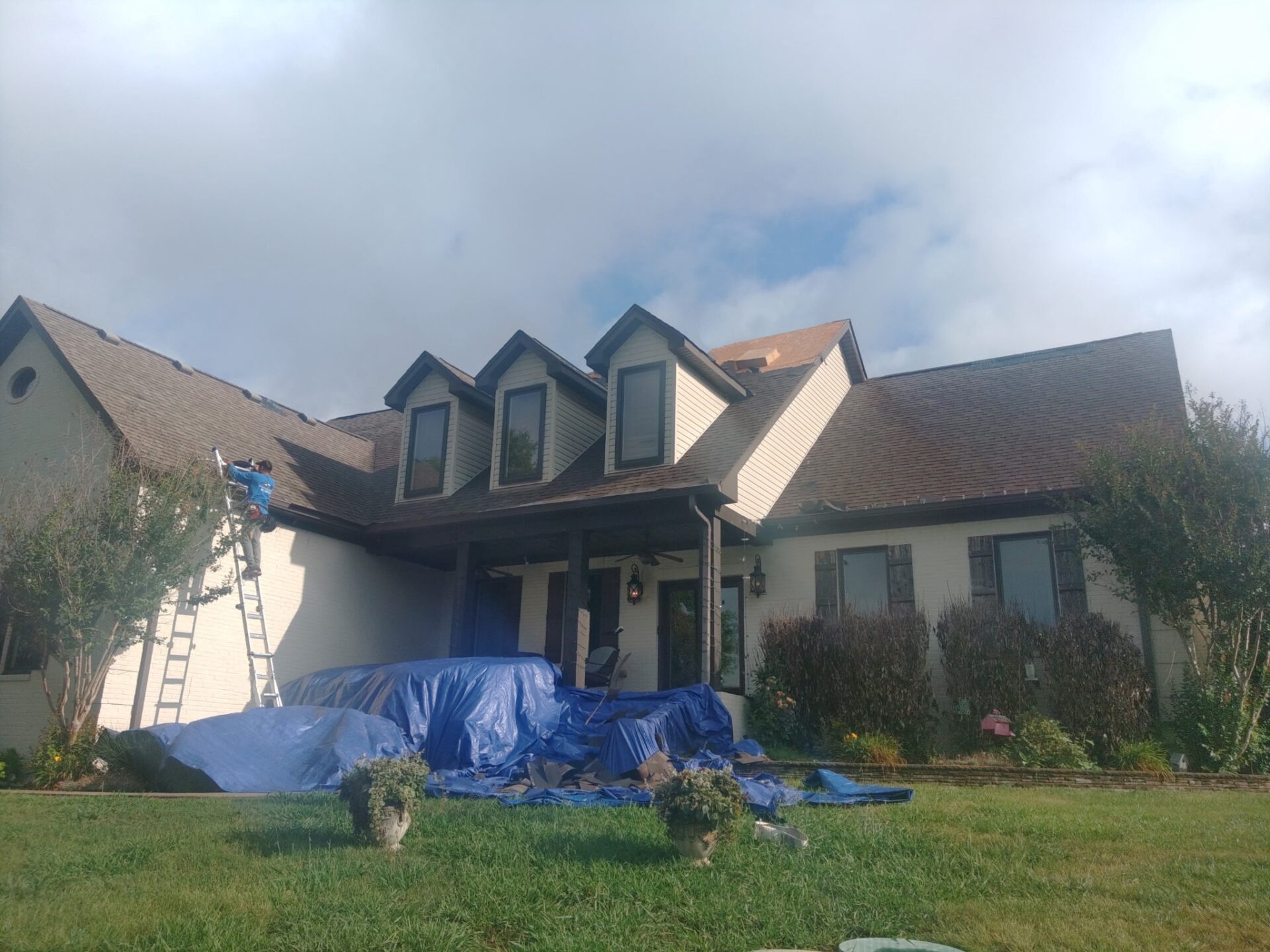 old shingles front- Romero's Roofing